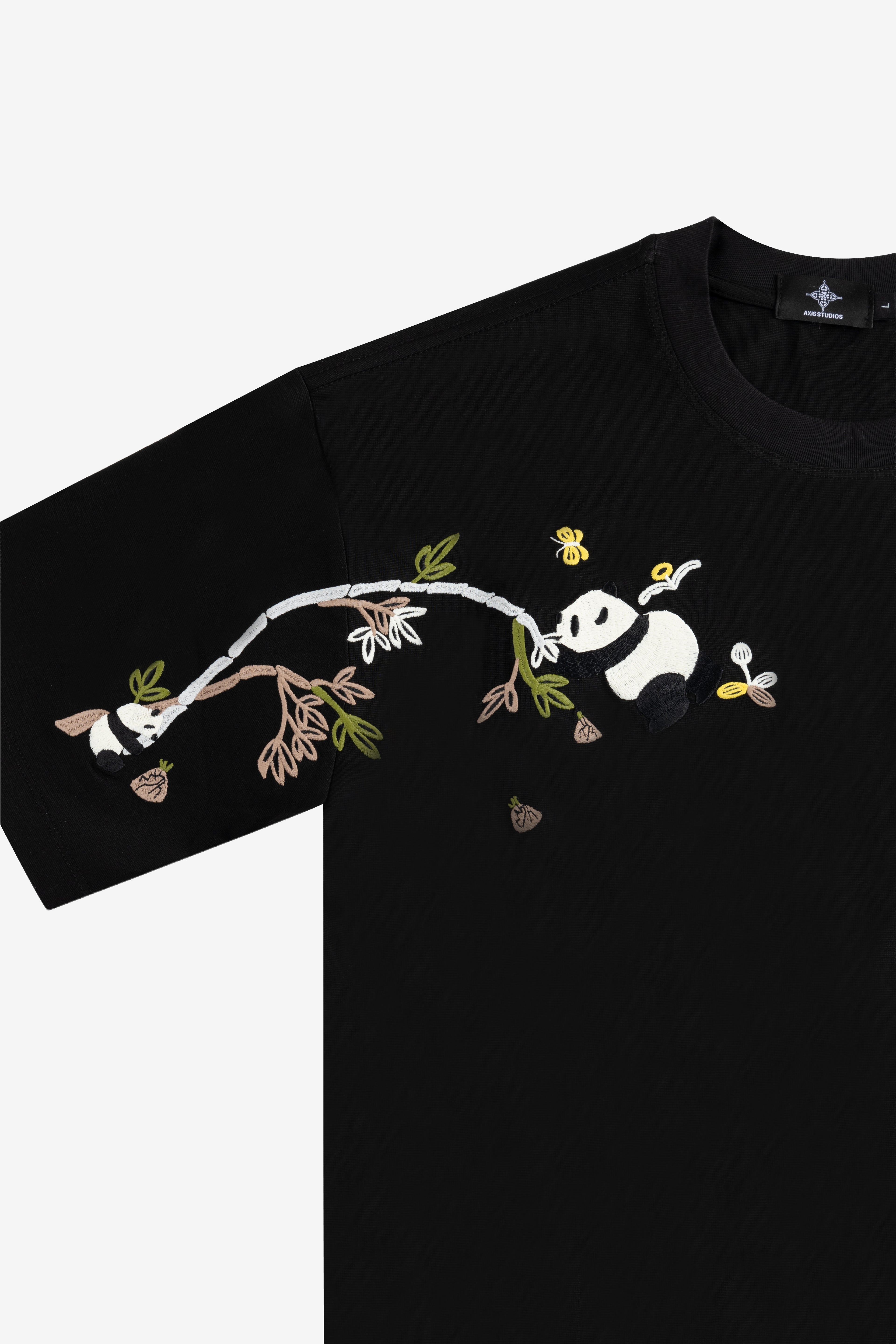 Black t-shirt with panda design on a white background