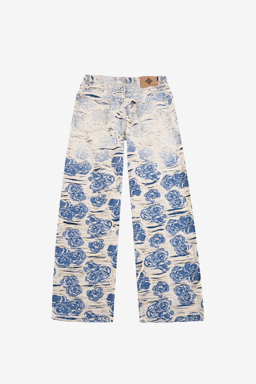 DISTRESSED PORCELAIN JEANS