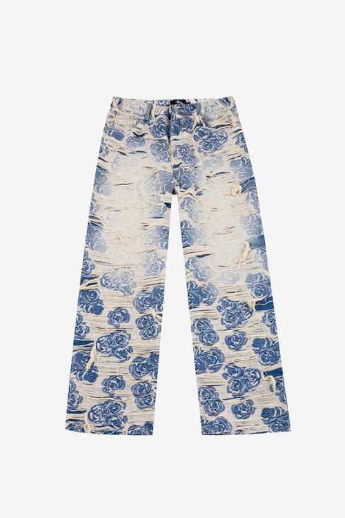 AXIS STUDIOS Distressed Porcelain Rose jacquard wide leg shredded blue and white denim jeans front view.