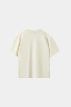 LVORY white oversized T-shirt with hand-embroidered panda and bamboo branch design across chest and sleeve, front view on white background.