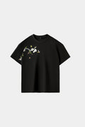 Obsidian black oversized T-shirt with hand-embroidered panda and bamboo branch design across chest and sleeve, front view on white background.