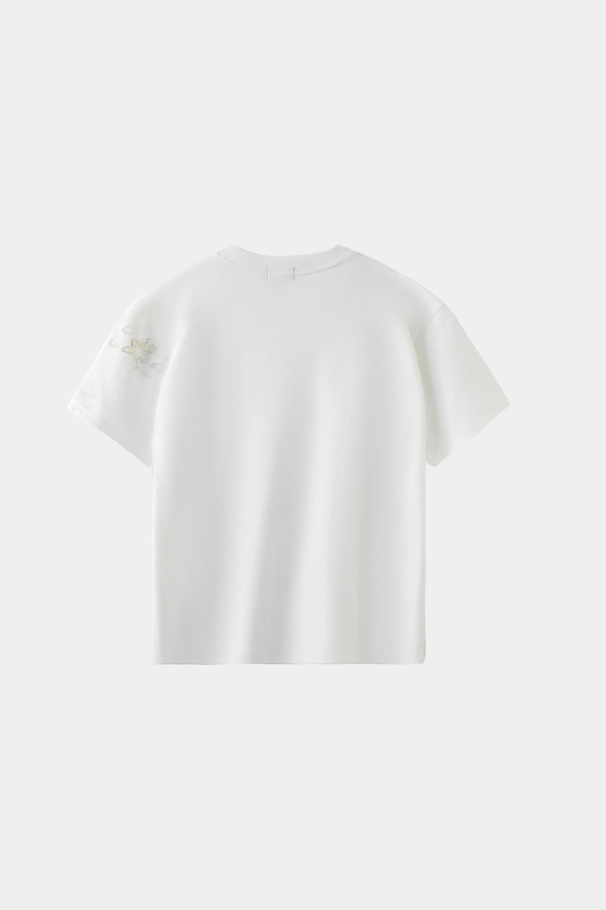 AXIS Studios Sampaguita hand-painted tee in pearl white with watercolor jasmine flowers, white background.