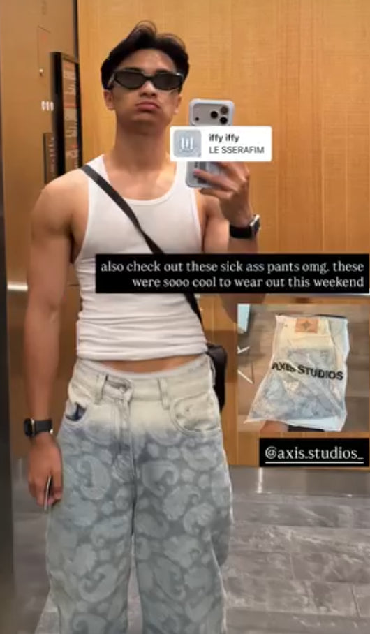Axis Studios customer mirror selfie showcasing Cloud , user-generated fit check with shopping bag and social media overlay.